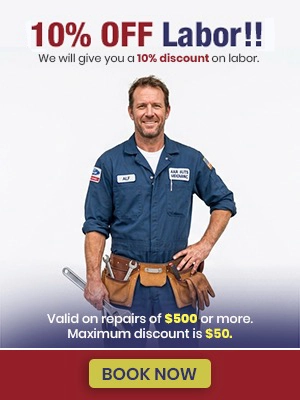 revisedAds Creative 5 A happy auto mechanic offering 10% off labor in an image.